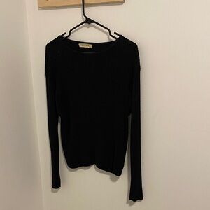 Gillian Stevens black turtleneck